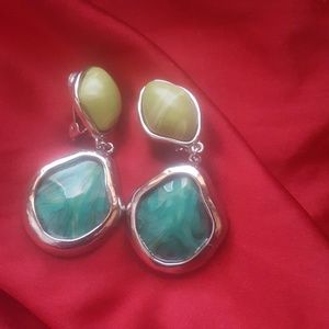 Green dangle clip earrings